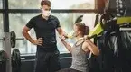 ainer-Teaching-A-Female-Client-On-Pec-Flye-Machine.webp