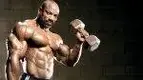 Dexter-Jackson-Raising-Dumbbell-Mr-Olympia-Legend.webp