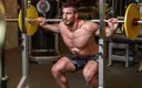 man-squat-gym.webp