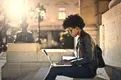 woman-at-laptop-outside-1024x679.webp