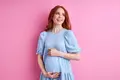 Pregnant-woman-blue-dress.webp