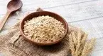 Rolled-Oats-Cereal-In-A-Wooden-Bowl.webp