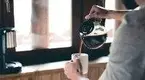 Man-Pouring-Coffee.webp