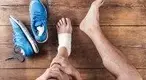 Runner-With-An-Ankle-Injury-And-Knee-Pain.webp