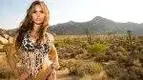 Wearing-Snake-Skin-Bikini-At-Joshua-Tree-Landscape.webp