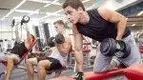 g-Men-Lifting-Weights-And-Working-Out-In-The-Gym-1.webp