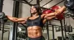 a-Winner-Andrea-Shaw-performing-a-dumbbell-workout.webp