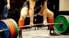 Powerlifter-Attempting-Deadlift-Competition.webp