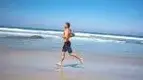 Ask-andy-mcdermott-running-on-the-beach.webp