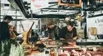 Butchers-at-a-store-in-a-meat-market.webp