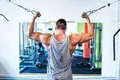 ybuilder-working-out-the-biceps-in-the-gym-PUYCGVW.webp