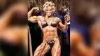 ampion-Helle-Trevino-Holding-A-Bodybuilding-Trophy.webp