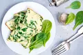 Egg and spinach omelet on a plate