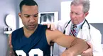 Athlete-Being-Checked-By-Doctor-Range-Of-Motion