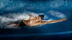 Underwater view of a swimmer swimming in a pool