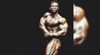 Kevin Levrone posing on stage