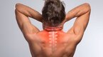 Man suffering from thoracic spinal pain