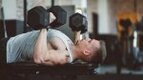 Ma doing dumbbell shoulder workouts with the dumbbell bench press exercise