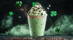 St. Patricks Day milkshake mocktail sprinkled with chocolate chips and whip cream