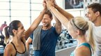 Group-High-Five-Postive-People-In-Gym