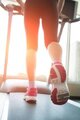 Woman Running on Treadmill