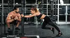 seth-rollins-becky-lynch-sled-push.webp