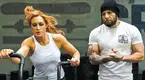 Josh-Gallegos-Training-Becky-Lynch-On-Bike.webp